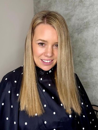 Long, dark brown tape-in hair extensions